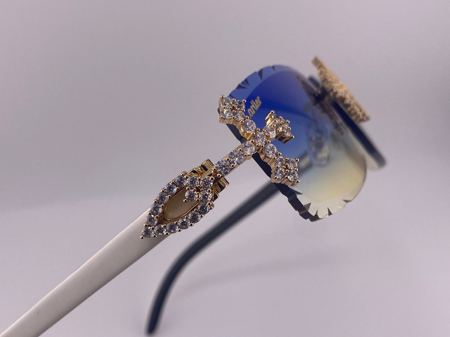 Iced Out Cross White Buffs - Diamond Cut Blue Lens