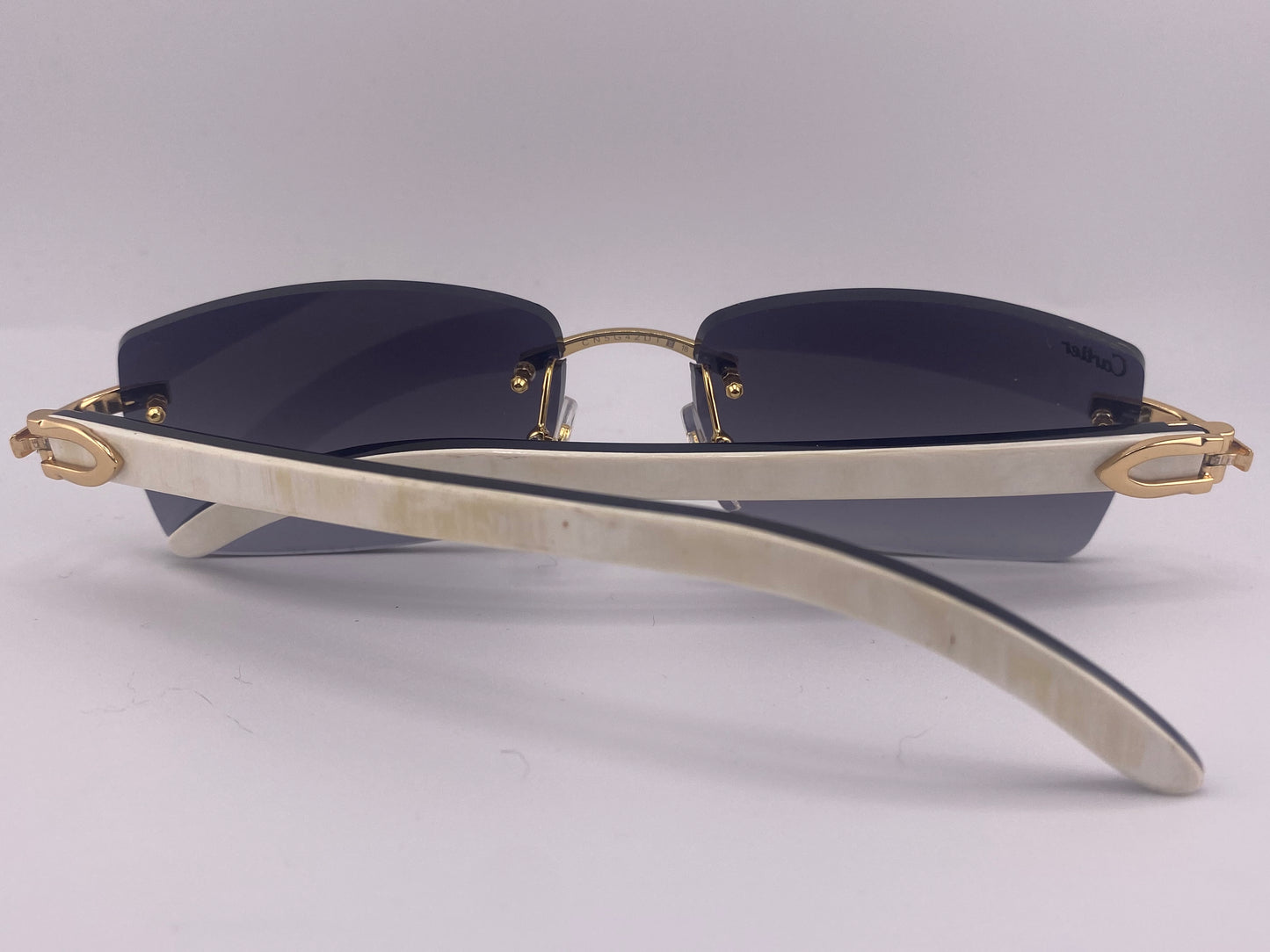 White Buffs - Black Tinted Lens