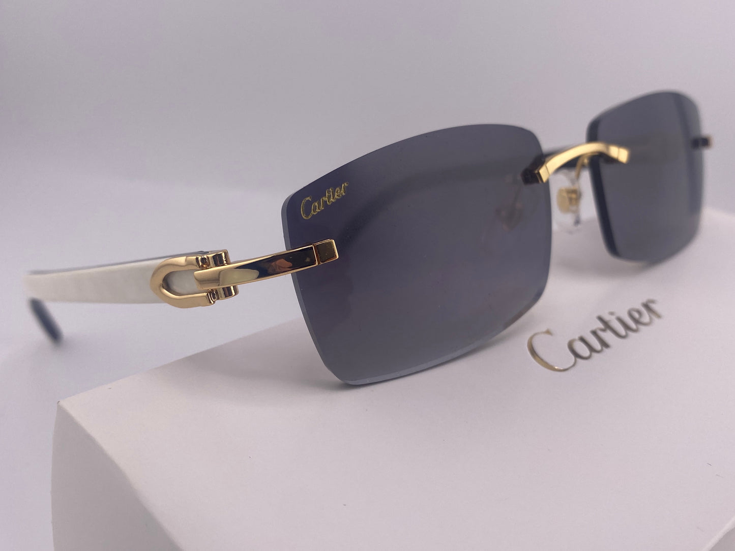 White Buffs - Black Tinted Lens